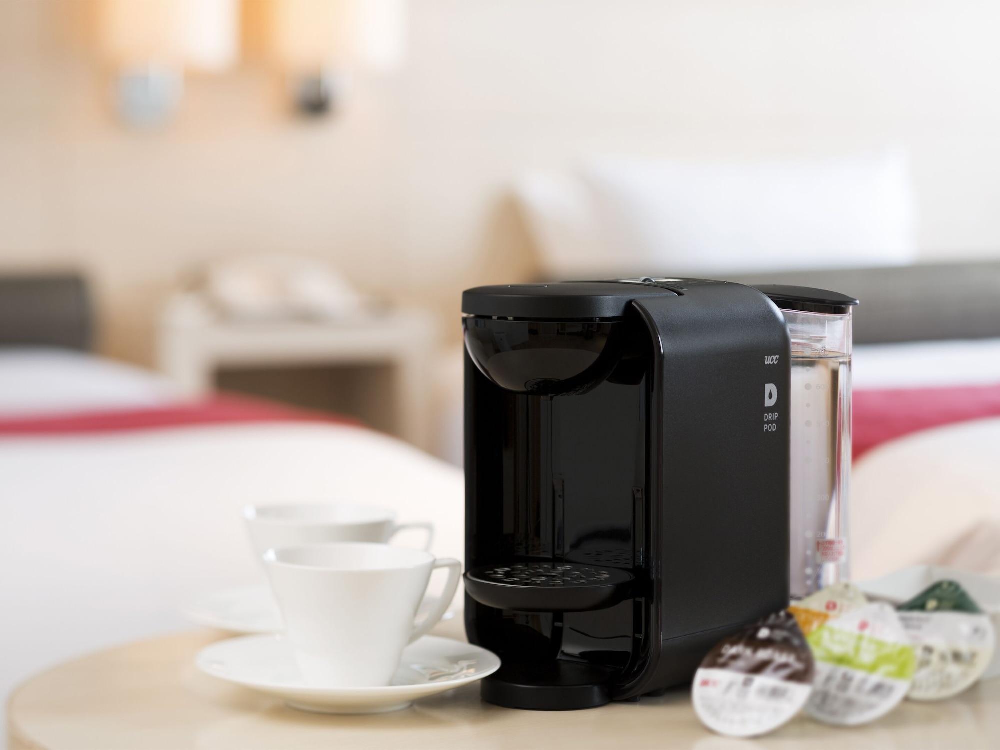 Sapporo Grand Hotel Bagian luar foto A single serve coffee machine