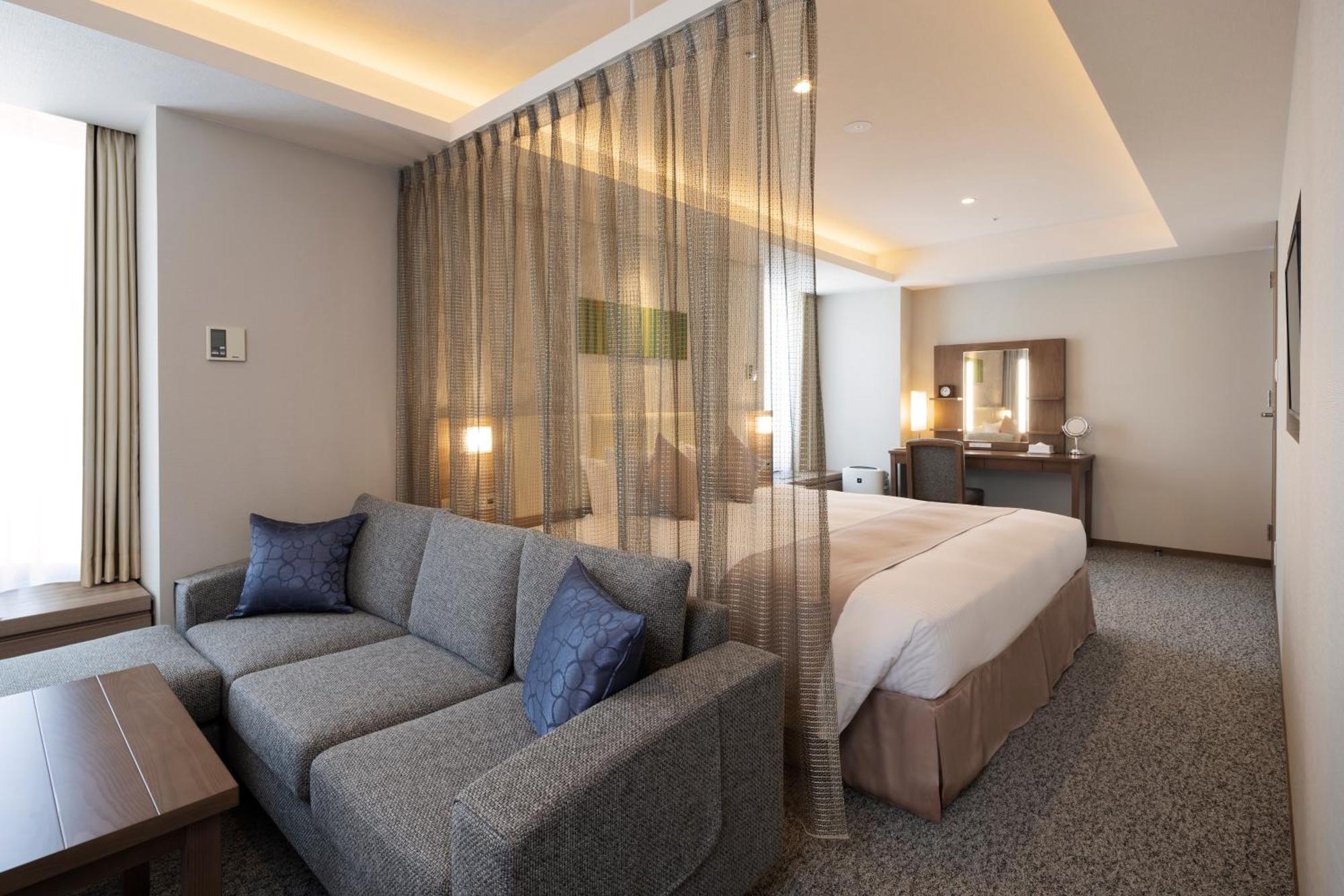 Sapporo Grand Hotel Bagian luar foto Deluxe Suite